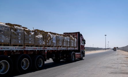A truck near the Rafah border crossing transports humanitarian aid bound for Gaza.