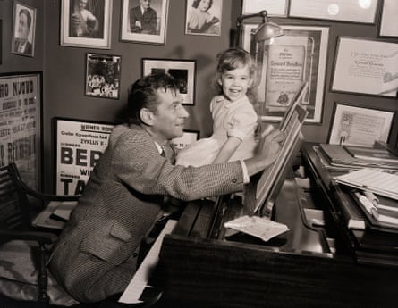 young Jamie Bernstein helps her father with his work in the 1950s.