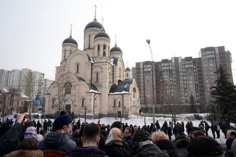 People gather outside the Church of the Icon of the Mother of God Soothe My Sorrows in Moscow on Friday.