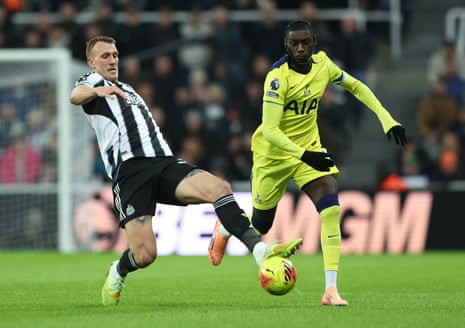 Dan Burn in action with Randal Kolo Muani.