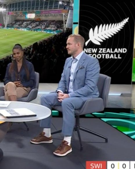 Jonas Eidevall wearing brown pumps with white socks and a suit