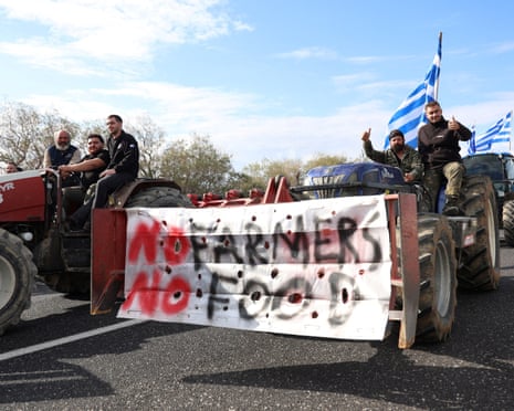 Greek farmers drive their tractors towards the Heraklion International Airport, in Heraklion, Crete island, Greece.