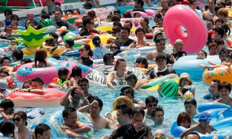 Bathers in a pool at Toshimaen amusement park in Tokyo