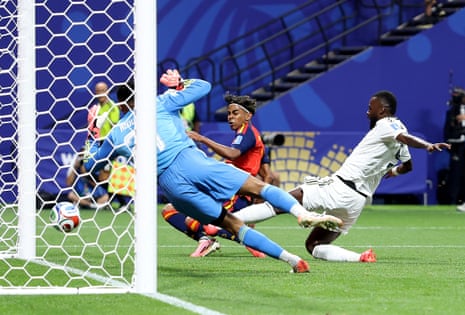 Lamine Yamal #19 of Spain scores his team's first goal