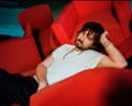 Kevin Parker on red couch
