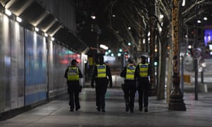 police patrol empty streets in melbourne