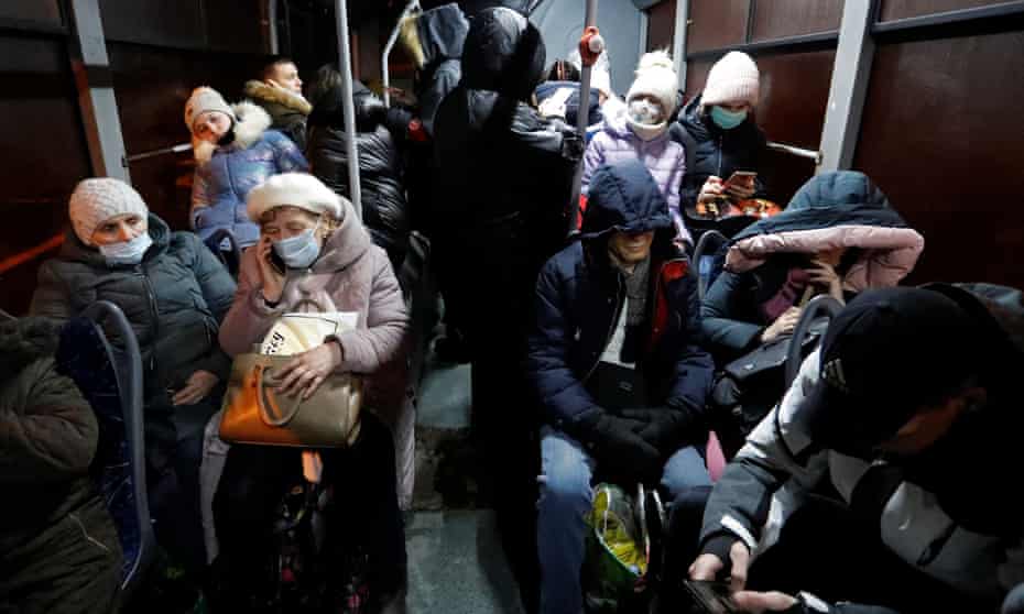 Masked passengers in bus