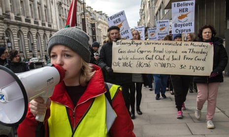Demonstrators march from the Cypriot high commission to the Foreign Office in London