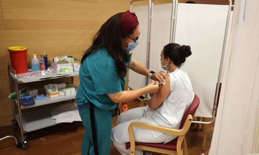Woman receiving injection