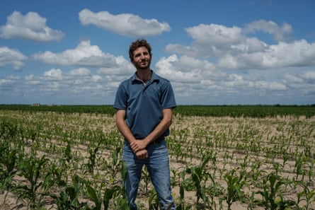 man standing in a field