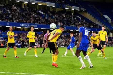 Chelsea’s Danny Welbeck (right) scores their side's sixth goal of the game.
