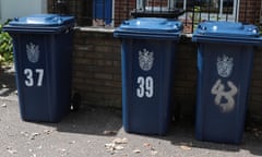 Blue bins lined up on a street in Cambourne