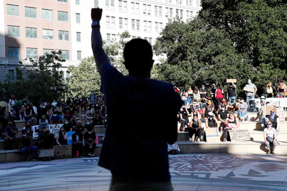 Protesters gather in Frank Ogawa Plaza in Oakland during a peaceful sit-in and march in the wake of George Floyd’s death on 4 June 2020.