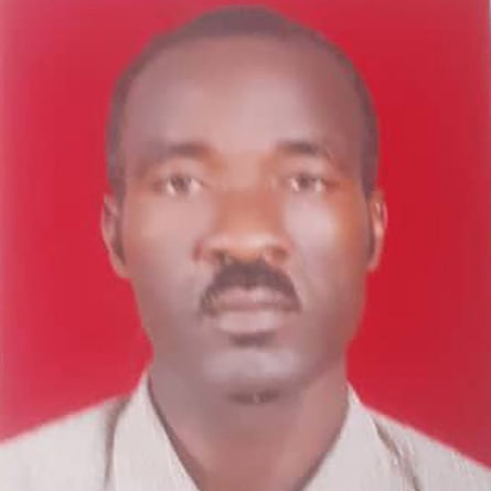 An ID-type headshot of a youngish black African man