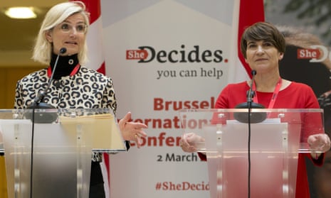 Dutch development minister Lilianne Ploumen, right, stands alongside Danish counterpart Ulla Tornaes at the She Decides conference in Brussels