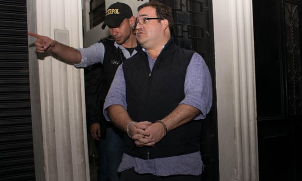 Javier Duarte is escorted by police following his arrest in Guatemala on 15 April 2017. He had 41 properties seized as part of the plea deal.