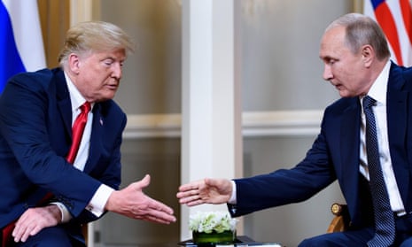 President Donald Trump and Russian President Vladimir Putin reach to shake hands before a meeting in Helsinki. The handshake lasted about three seconds