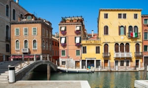 Old houses and bridge over Canal De Cannaregio in Venice, Veneto, Italy