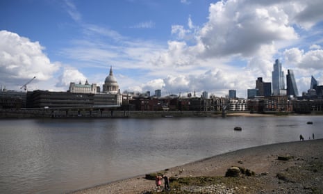 a mudlark looks for items of historic interest on the foreshore of the Thames.
