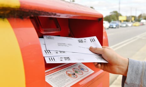 Sealed envelopes from the marriage law postal survey being posted.