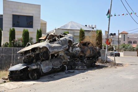 A pile of burned cars in Turmus Ayya, after Israeli settlers attacked the village.