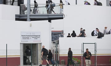 Migrants with interviews are allowed to enter the United States at the Chaparral pedestrian border on May 16, 2023, in Tijuana, Mexico.