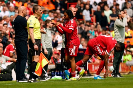 Rio Ngumoha goes to greet Arne Slot as Alexander Isak comes on in his place
