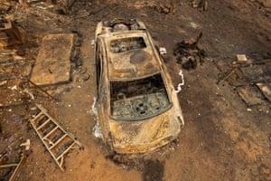A burnt car in the Oak Ridge mobile home park