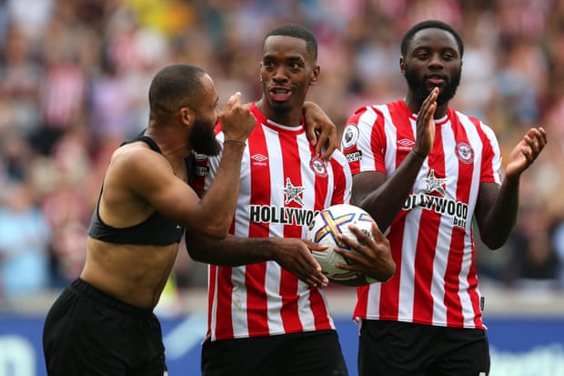 Evan Toni (centre) takes the match ball with him after he scored a hat-trick for Brentford against Leeds.