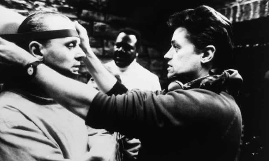 Jonathan Demme, right, directing Anthony Hopkins as Hannibal Lecter in The Silence of the Lambs, 1991.