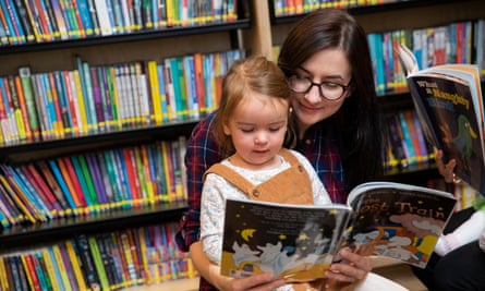 Storyhouse ChesterFor Guardian Labs Public Services Award supplement. Pictured are some of the Library team based at the Storyhouse complex in Chester. Pictured are Weronika Williams with Zofia(3)in the children’s library. Photo by Fabio De Paola