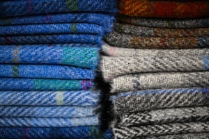 Piles of folded Harris tweed
