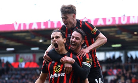 Enes Unal celebrates scoring on his first Premier League start for Bournemouth.