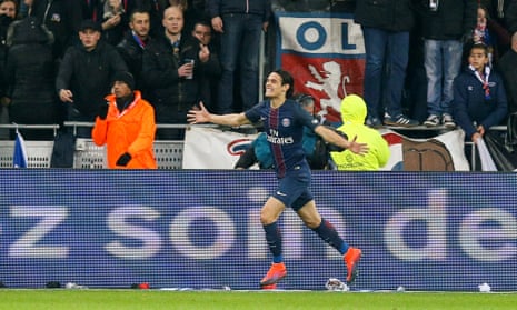 Edinson Cavani celebrates scoring PSG’s decisive second goal at Lyon.