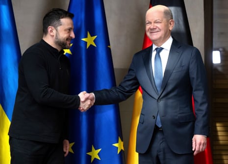 Germany's chancellor Olaf Scholz, right and Ukraine's president Volodymyr Zelenskyy, meet for talks at the Munich Security Conference.