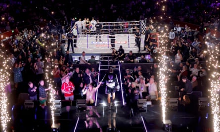 Caroline Dubois walks to the ring