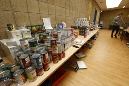 Tins stacked in a food bank