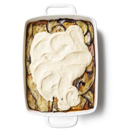 Felicity Cloake’s Vegan Moussaka. Spoon over the sauce, then top with the aubergines and season with a little more oregano. Spoon the bechamel all over the top and level it out.
