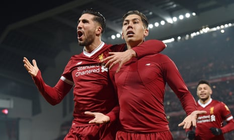 Roberto Firmino (centre) celebrates with Emre Can after putting Liverpool 2-1 up against Manchester City
