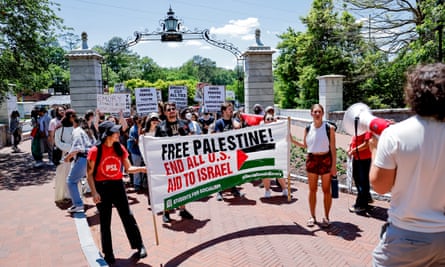 Protesters with banner protest against war in Gaza