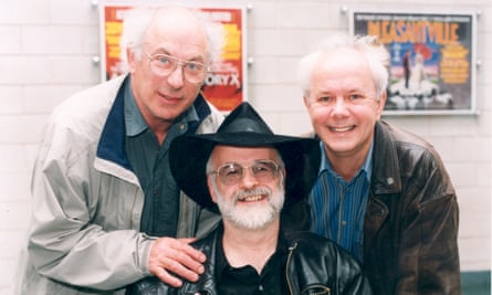 Jack Cohen, left, with Terry Pratchett, centre, and Ian Stewart at a book signing in Warwick.