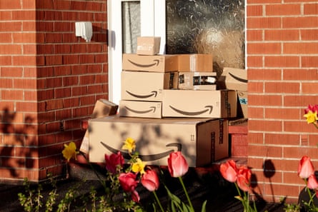 Large pile of Amazon deliveries on a doorstep
