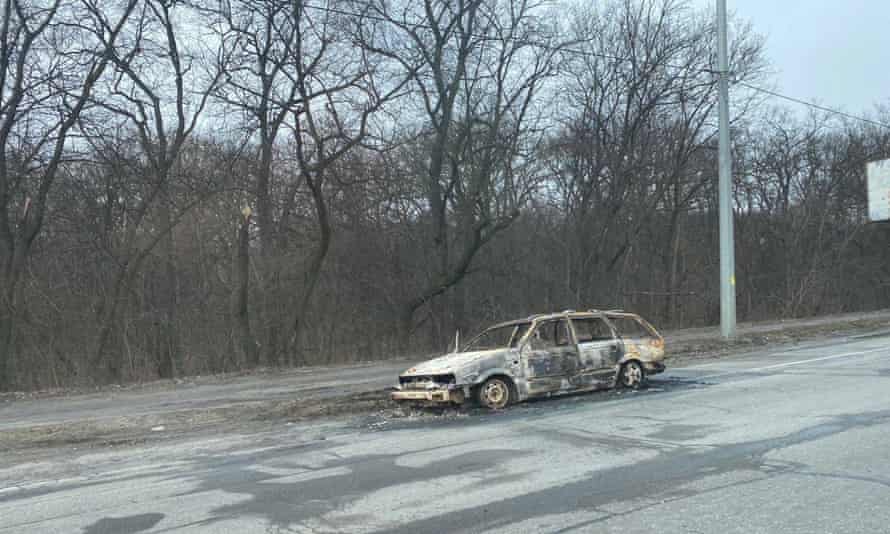 A burned-out car in Kyiv.