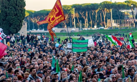 People protest during a demonstration organized by No Green Pass and No Vax movements against the Green Pass Covid-19 health certificate, at Circo Massimo in Rome, Italy.