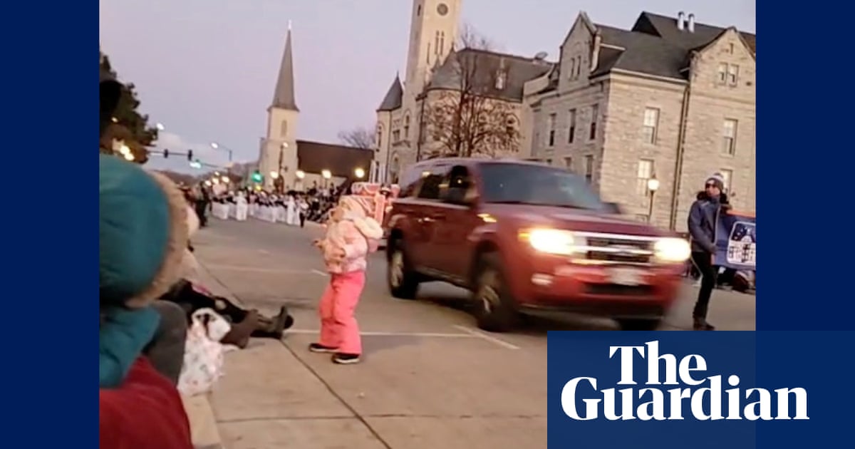 Social media footage shows SUV speeding through Wisconsin Christmas parade – video