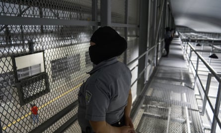 Officers guard corridors and cells at a new maximum security prison in Tecoluca, San Vicente.