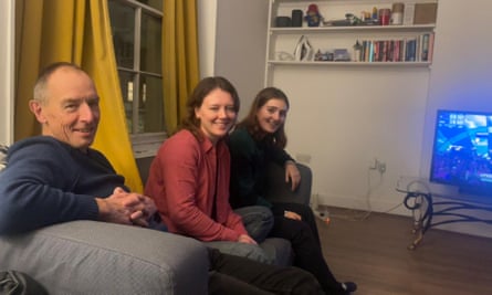 Eilidh Milne, 26, (centre) watches the final with her father Willie and relative Shona. Milne said she