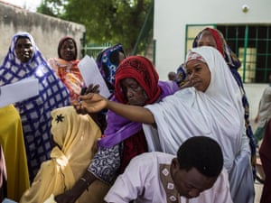 Women widowed by the conflict register to receive economic support from the International Committee of the Red Cross.
