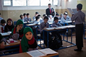 Girls attend classes at the Wesa Academy where they now make up more than a third of the pupils at Kandahar’s first co-educational school.