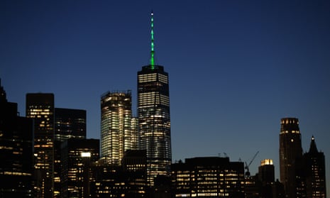 New York's One World Trade Center illuminated in green light